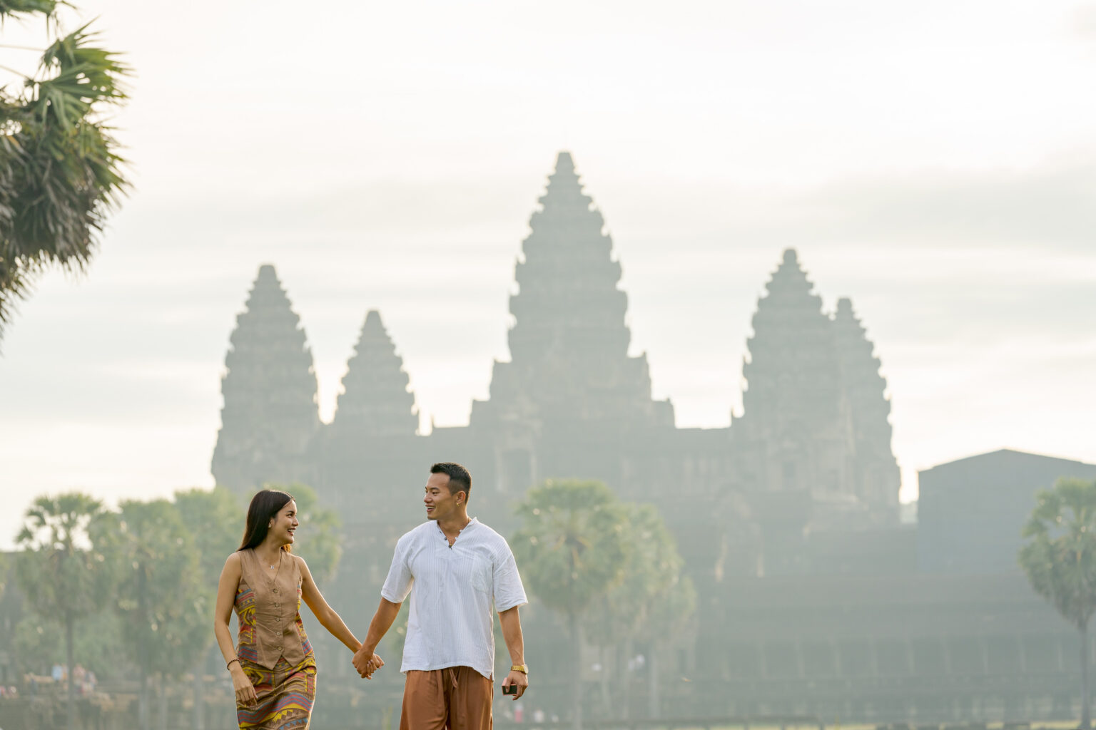 Couple at Angkor Wat at Sunrise on a photoshoot with Siem Reap Photographer