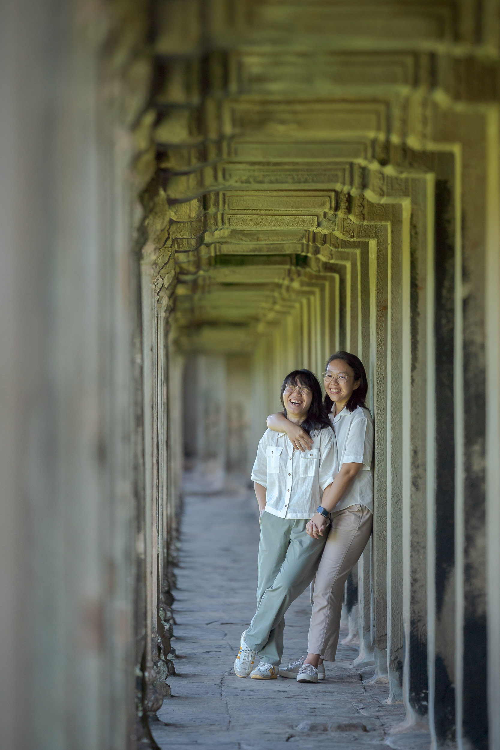 LGBTQ Couple on a photoshoot with Siem Reap Photographer in Siem Reap at Angkor Wat Temple, Cambodia