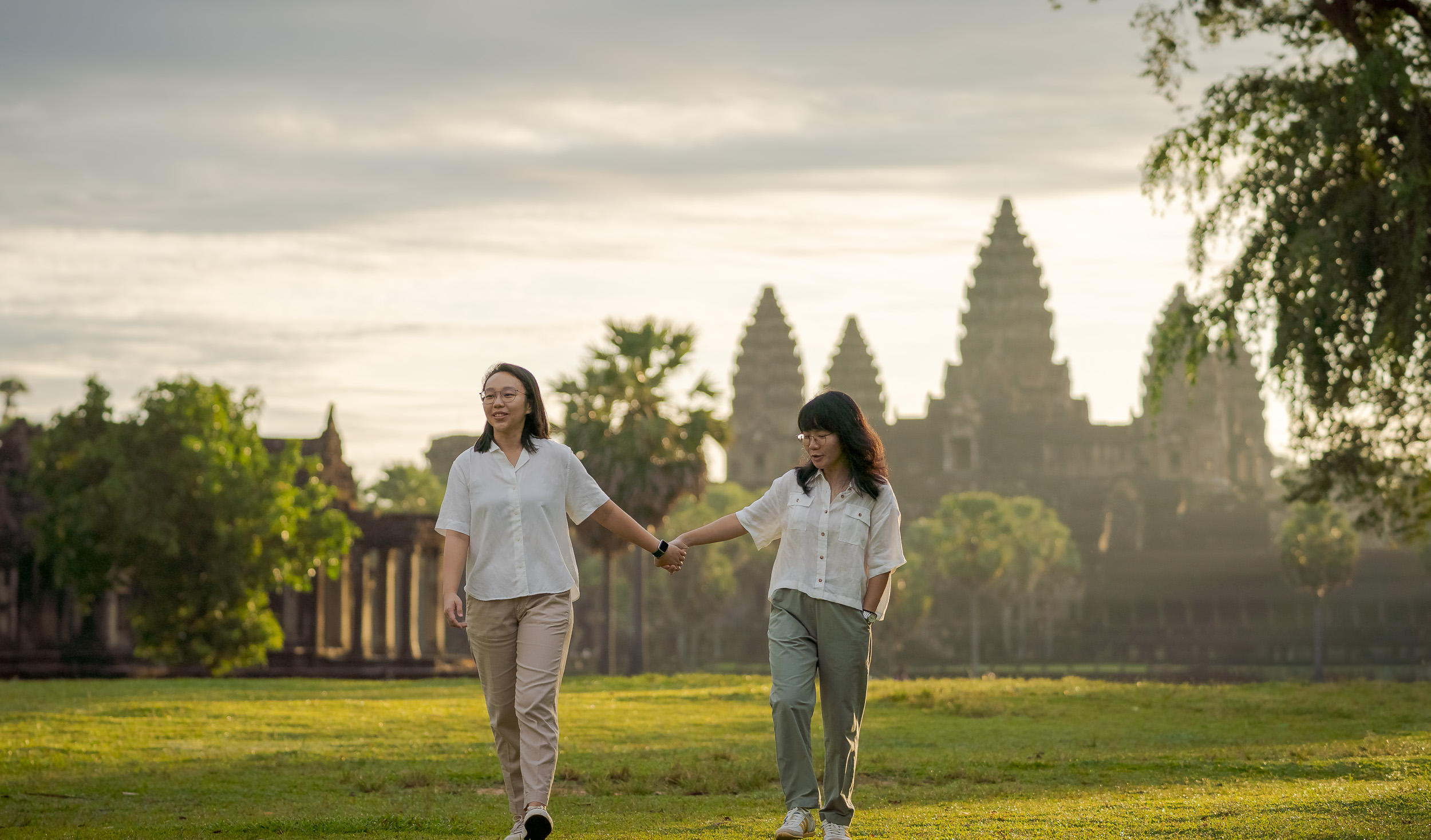 LGBTQ Couple on a photoshoot with Siem Reap Photographer in Siem Reap at Angkor Wat Temple, Cambodia