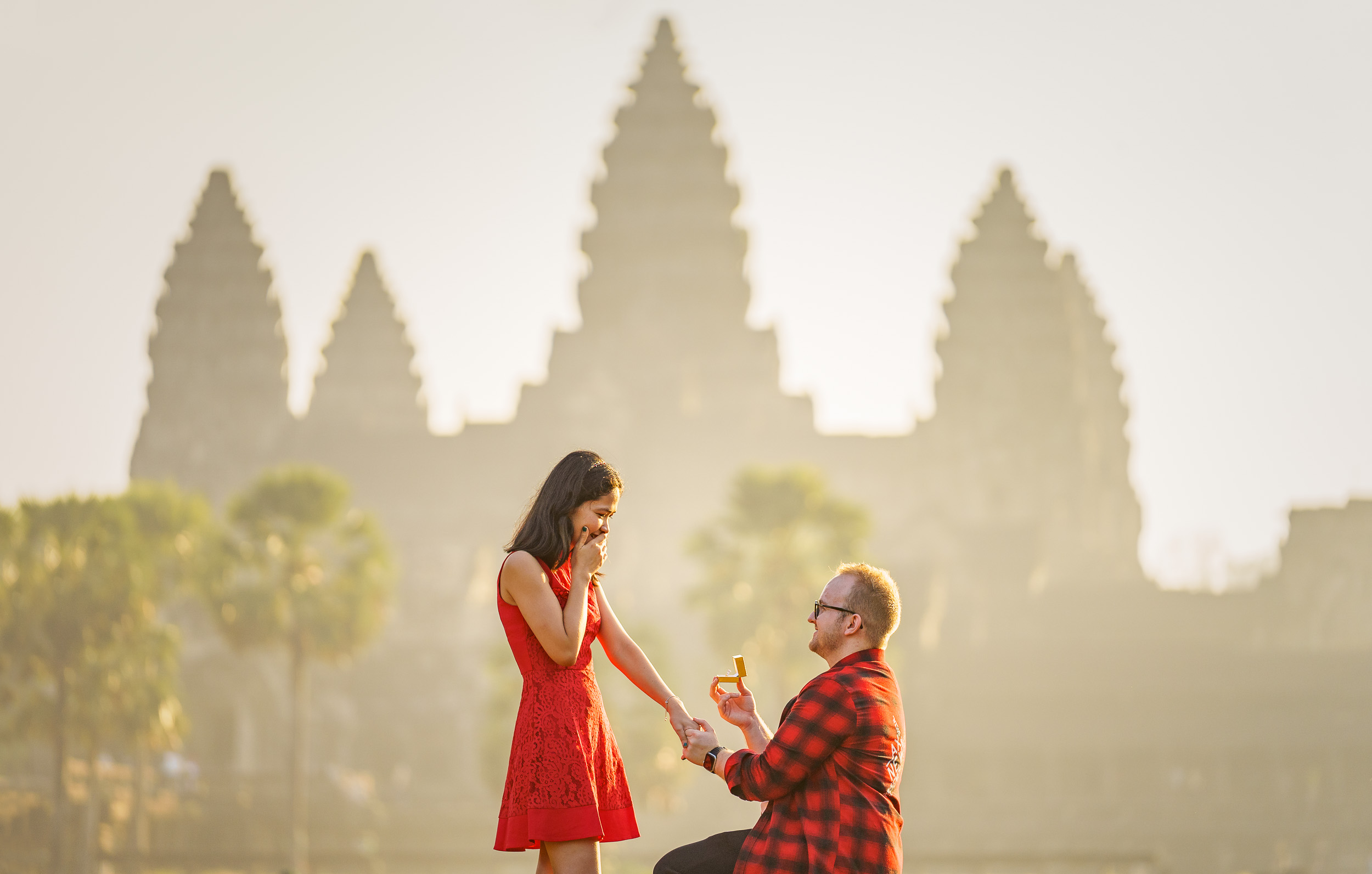 Man proposing to lady at Angkor Wat at sunrise