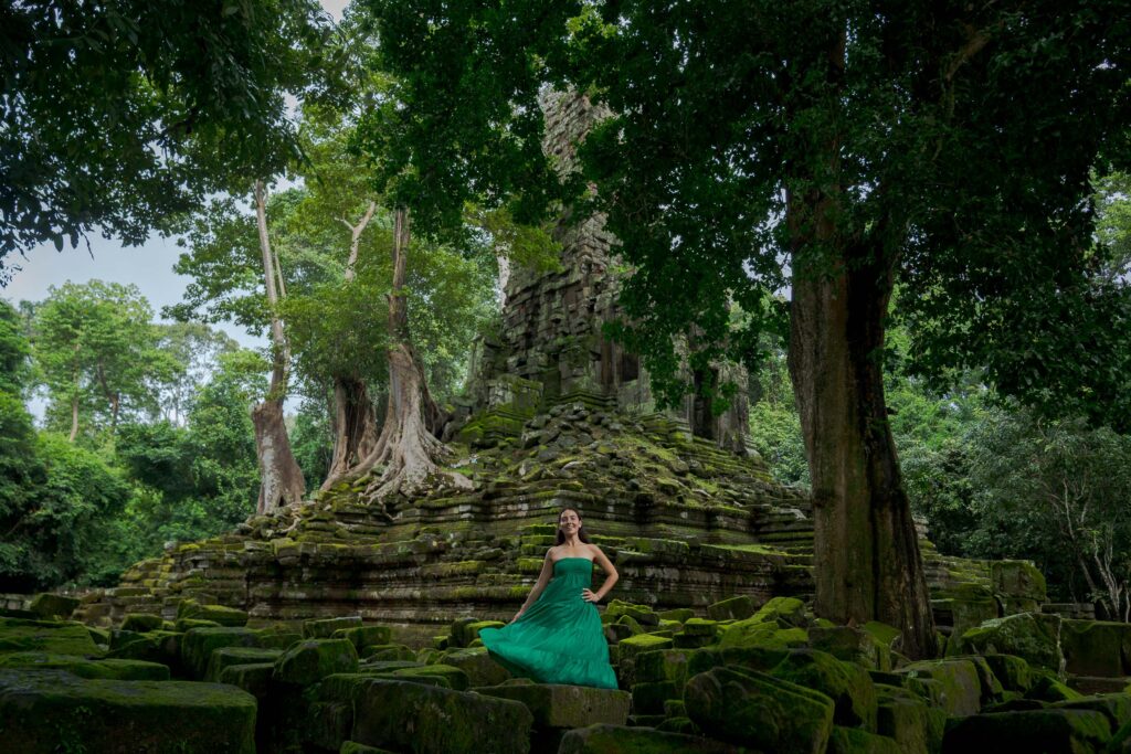 Solo traveller photoshoot at hidden jungle temple near Angkor Wat in Siem Reap