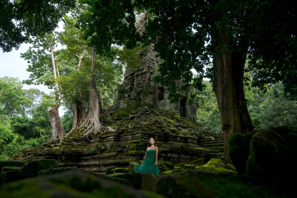 Solo traveller photoshoot at hidden jungle temple near Angkor Wat in Siem Reap