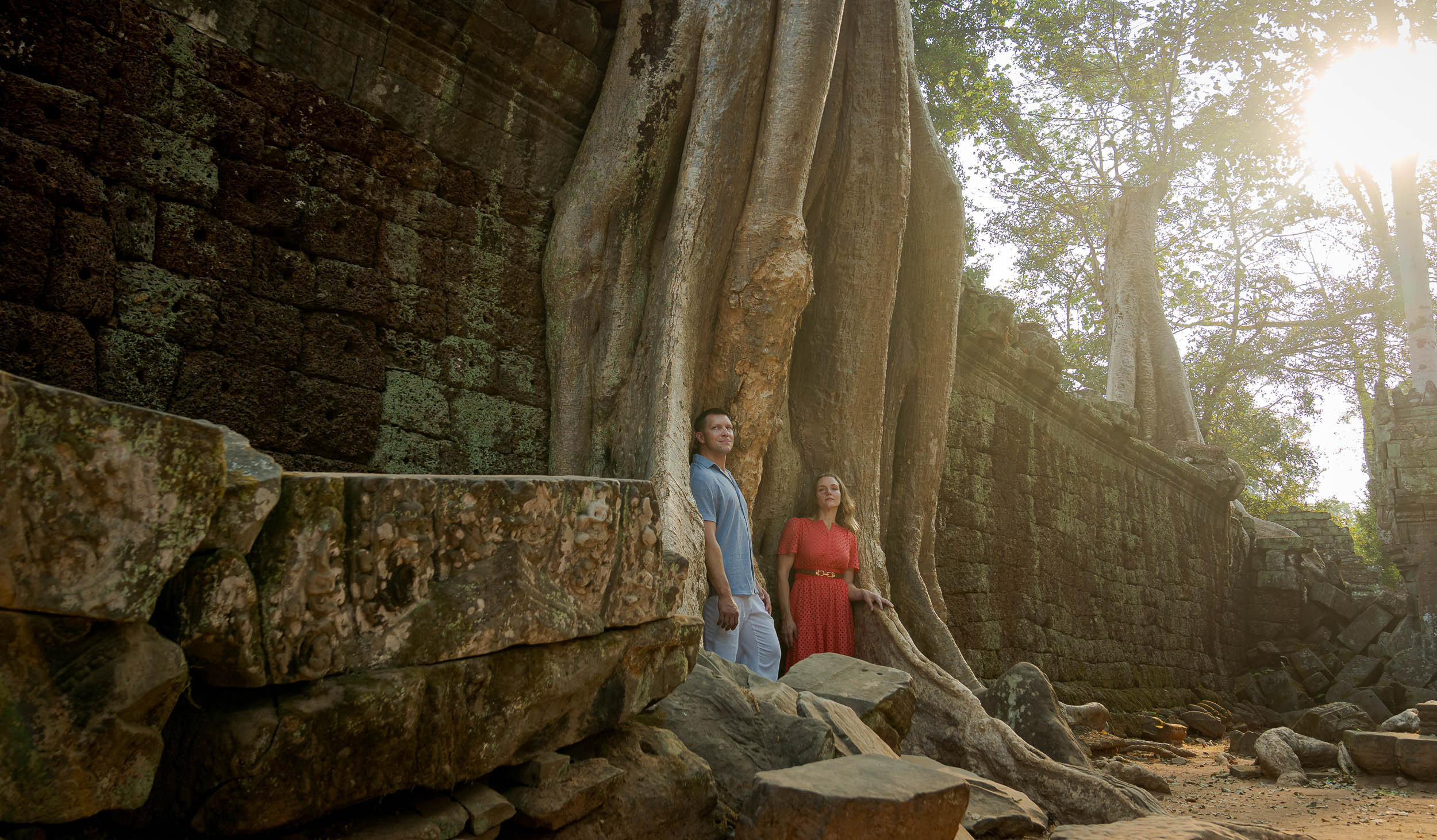 couple on a photoshoot with siem reap photographer at ta prom temple in siem reap, cambodia