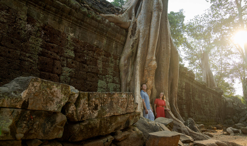 couple on a photoshoot with siem reap photographer at ta prom temple in siem reap, cambodia