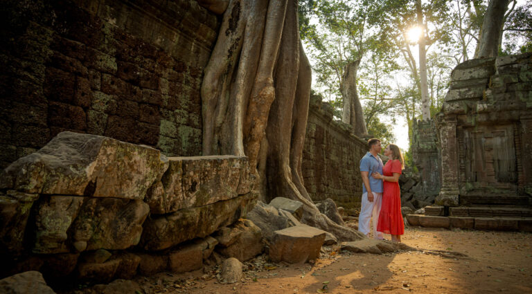 couple on a photoshoot with siem reap photographer at ta prom temple in siem reap, cambodia