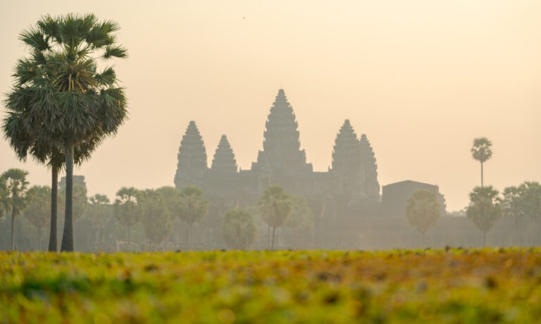 Angkor Wat at sunrise shot from gound level with no crowds